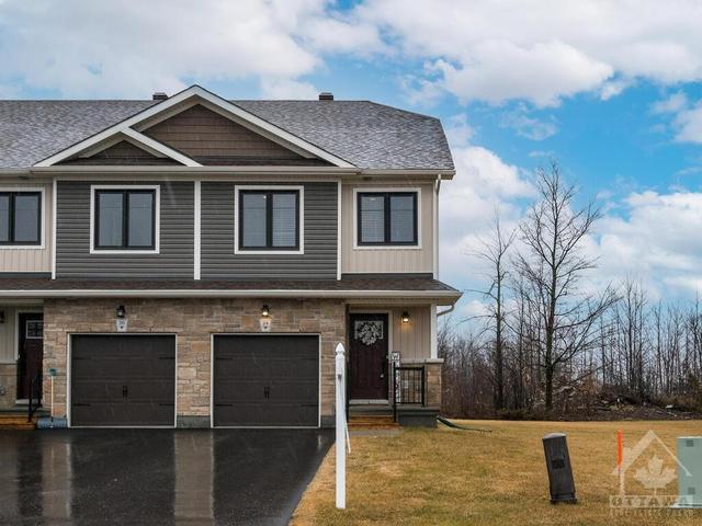 24 Staples Boulevard, Townhouse with 3 bedrooms, 3 bathrooms and 3 parking in Smiths Falls ON | Image 1