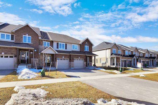 1615 Hetherington Dr W, House attached with 3 bedrooms, 3 bathrooms and 3 parking in Peterborough ON | Image 1