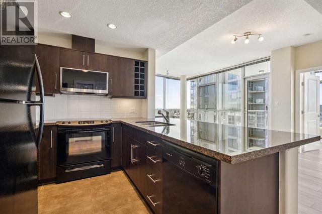 703, - 55 Spruce Place Sw, Condo with 2 bedrooms, 2 bathrooms and 1 parking in Calgary AB | Image 2