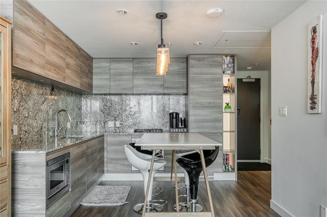 1206 - 310 12 Avenue Sw, Condo with 1 bedrooms, 1 bathrooms and 1 parking in Calgary AB | Card Image
