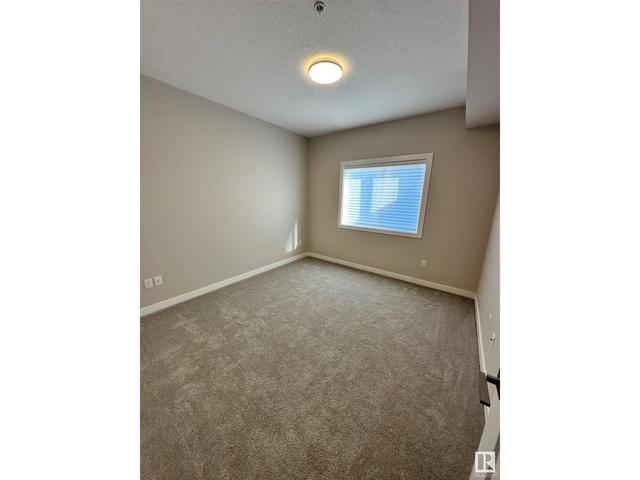 405 - 560 Griesbach Pr Nw, Condo with 2 bedrooms, 2 bathrooms and null parking in Edmonton AB | Image 7