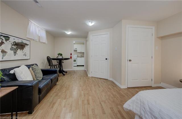 In the basement you’ll discover a fully-equipped 1-bed studio suite with kitchen and large, updated 3-pc bathroom, offering an ideal in-law setup or potential rental opportunity. | Image 9
