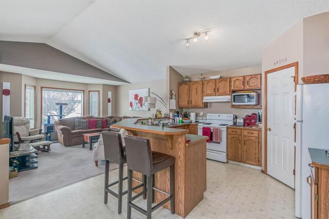 218 Arbour Stone Place Nw, House detached with 4 bedrooms, 3 bathrooms and 2 parking in Calgary AB | Image 10
