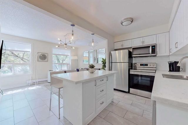 a/b/c - 61 Cameron St, House attached with 6 bedrooms, 3 bathrooms and 2 parking in Toronto ON | Image 11