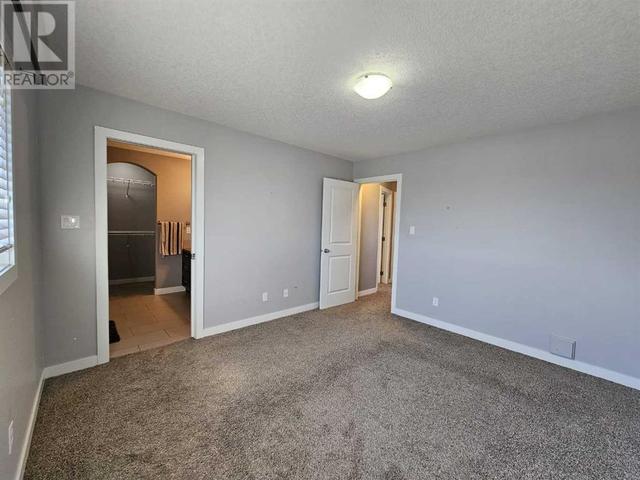85 Mt Sundial Court W, House detached with 4 bedrooms, 3 bathrooms and 2 parking in Lethbridge AB | Image 21