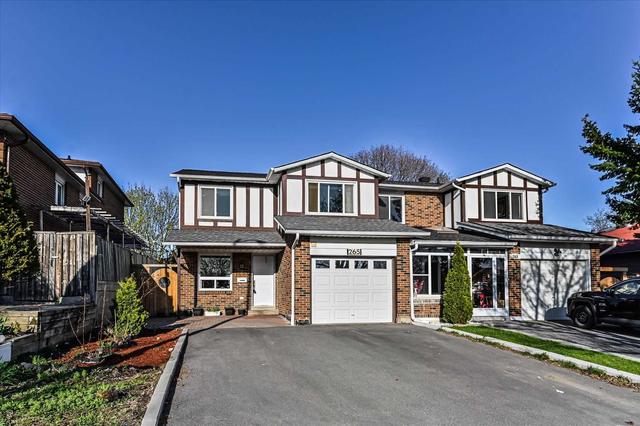 265 Cherokee Blvd, House semidetached with 4 bedrooms, 4 bathrooms and 5 parking in Toronto ON | Image 1