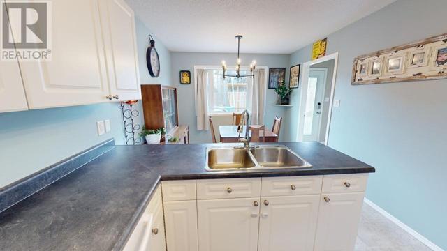 8728 81a Street, House detached with 3 bedrooms, 1 bathrooms and null parking in Fort St. John BC | Image 9