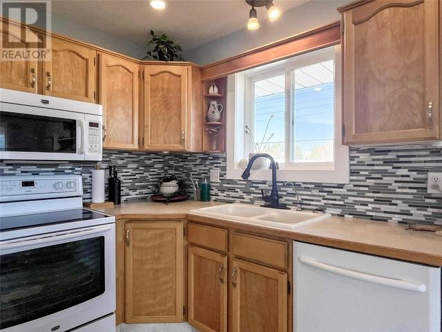 18 - 14008 Victoria Road, House attached with 2 bedrooms, 1 bathrooms and 1 parking in Summerland BC | Image 9