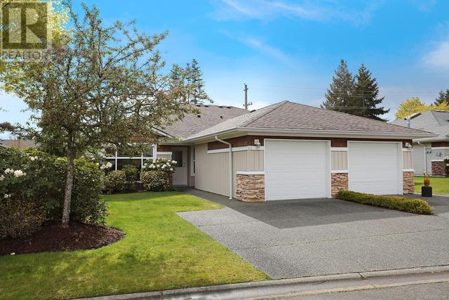 111 - 2077 St. Andrews Way, House attached with 2 bedrooms, 2 bathrooms and 2 parking in Courtenay BC | Card Image