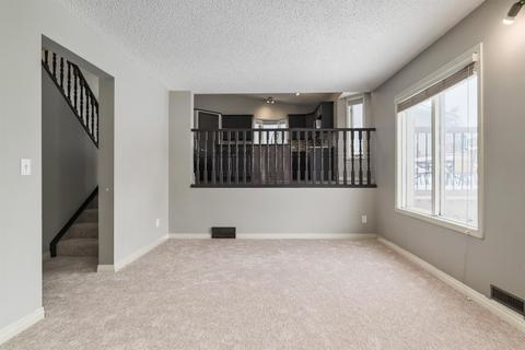 52 Waterstone Crescent Se, House detached with 3 bedrooms, 3 bathrooms and 4 parking in Calgary AB | Card Image