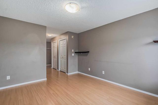 2105 - 700 Willowbrook Road Nw, Condo with 2 bedrooms, 2 bathrooms and 1 parking in Airdrie AB | Image 18