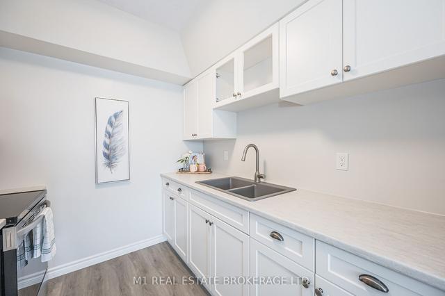 409 - 107 Bagot St, Condo with 1 bedrooms, 1 bathrooms and 1 parking in Guelph ON | Image 2