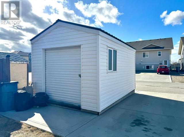 9009 93 Avenue, House detached with 4 bedrooms, 3 bathrooms and 2 parking in Grande Prairie AB | Image 29