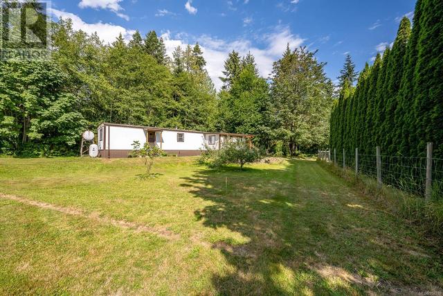 8185 Island Hwy S, House detached with 4 bedrooms, 4 bathrooms and 6 parking in Comox Valley A BC | Image 51