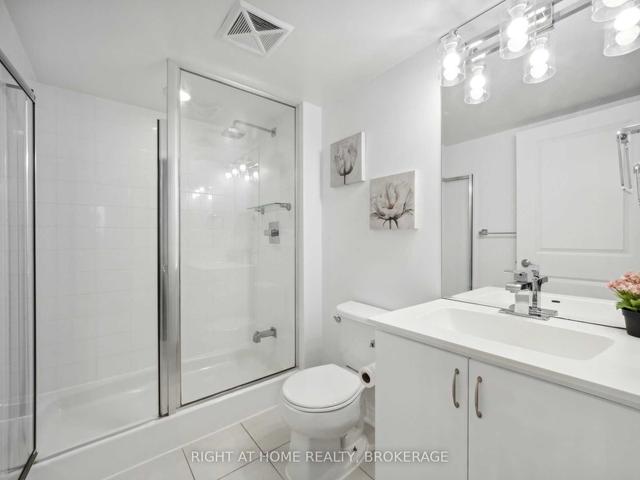 422 - 27 Rean Dr, Condo with 1 bedrooms, 2 bathrooms and 2 parking in Toronto ON | Image 2