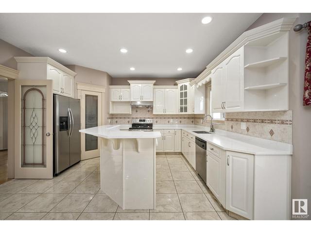 7710 168a Av Nw, House detached with 7 bedrooms, 5 bathrooms and 5 parking in Edmonton AB | Image 12