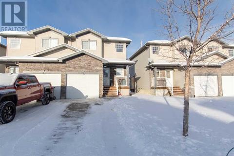 10326 70 Avenue, House semidetached with 3 bedrooms, 1 bathrooms and 2 parking in Grande Prairie AB | Card Image