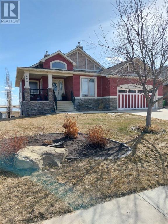 627 Boulder Creek Drive Se, House detached with 3 bedrooms, 2 bathrooms and 4 parking in Rocky View County AB | Image 2