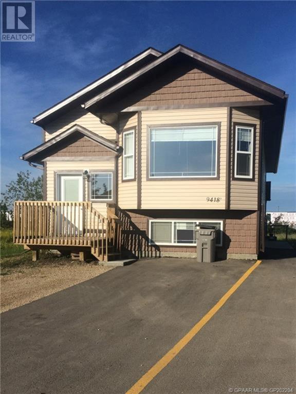 9418 93 Street, Home with 6 bedrooms, 2 bathrooms and 4 parking in Grande Prairie AB | Image 1