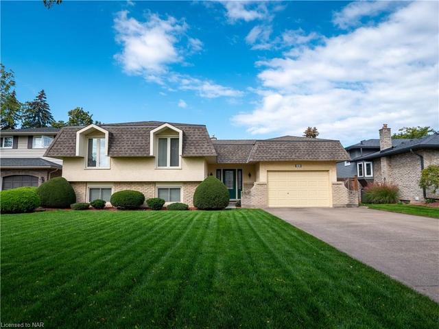 16 Village Green Drive, House detached with 5 bedrooms, 2 bathrooms and 8 parking in St. Catharines ON | Image 1