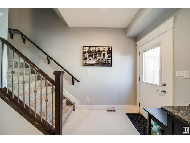 12428 113 Av Nw, House attached with 4 bedrooms, 3 bathrooms and null parking in Edmonton AB | Image 11