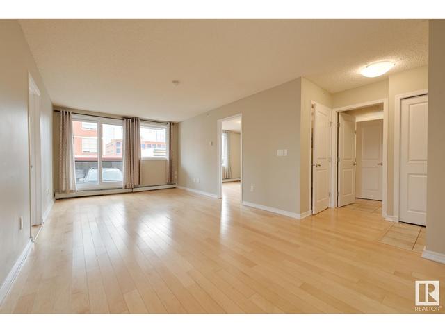 202 - 10303 105 St Nw, Condo with 2 bedrooms, 1 bathrooms and 1 parking in Edmonton AB | Card Image