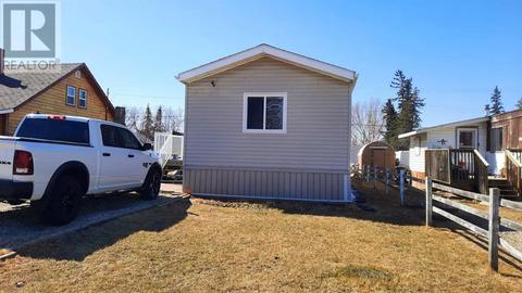 9728 99 Street, House other with 3 bedrooms, 1 bathrooms and 4 parking in Wembley AB | Card Image