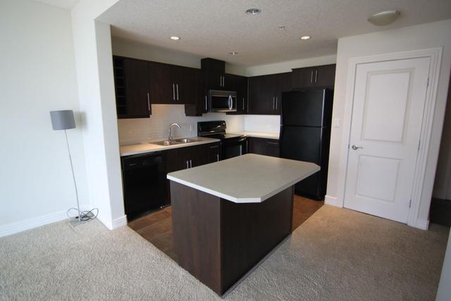 808 - 55 Spruce Place Sw, Condo with 1 bedrooms, 1 bathrooms and 1 parking in Calgary AB | Image 5
