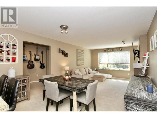 301 - 700 Klahanie Drive, Condo with 2 bedrooms, 2 bathrooms and 2 parking in Port Moody BC | Image 7