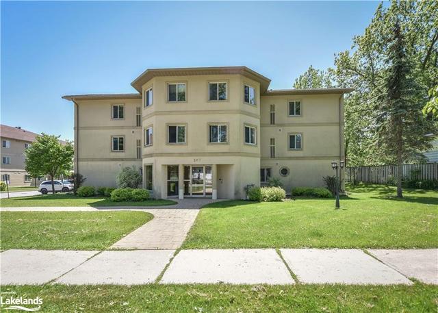 201 - 107 Bond Street, House attached with 2 bedrooms, 1 bathrooms and 1 parking in Orillia ON | Image 1
