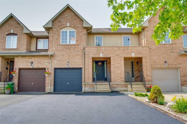 100 Meadow Wood Cres, House attached with 3 bedrooms, 3 bathrooms and 3 parking in Hamilton ON | Image 1