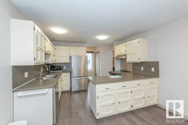 14707 51 Av Nw, House attached with 3 bedrooms, 1 bathrooms and null parking in Edmonton AB | Card Image