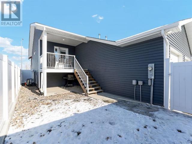 910 9 Avenue Se, Home with 3 bedrooms, 2 bathrooms and 4 parking in Redcliff AB | Image 24