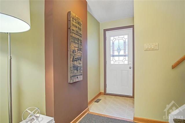 52 Tarquin Crescent, Townhouse with 3 bedrooms, 2 bathrooms and 4 parking in Ottawa ON | Image 3