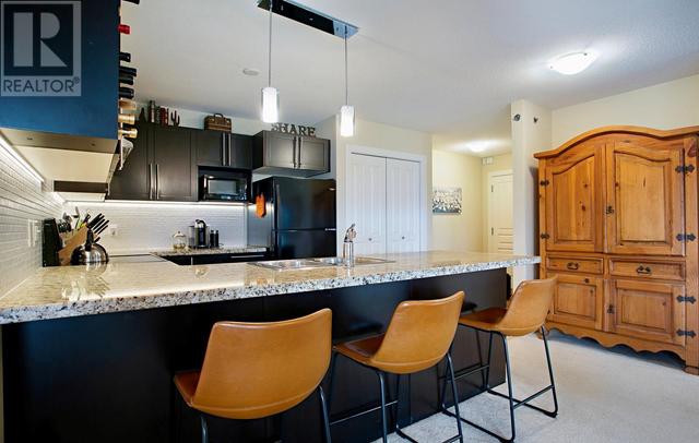 412 - 1093 Sunset Drive, Condo with 3 bedrooms, 2 bathrooms and 1 parking in Kelowna BC | Image 9