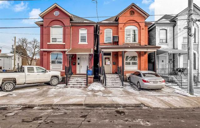 312 Catharine St N, House detached with 5 bedrooms, 2 bathrooms and 4 parking in Hamilton ON | Image 1