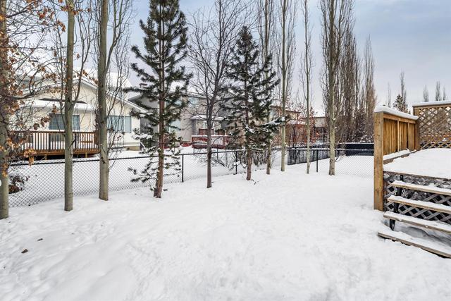 82 Cougarstone Circle Sw, House detached with 4 bedrooms, 2 bathrooms and 4 parking in Calgary AB | Image 27