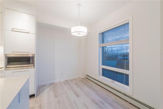 108 - 3125 39 Street Nw, Home with 2 bedrooms, 2 bathrooms and 1 parking in Calgary AB | Image 23