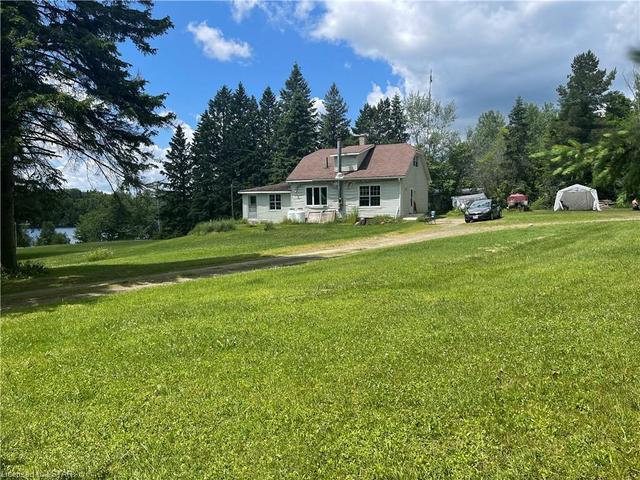 2442 Highway 520, House detached with 4 bedrooms, 2 bathrooms and 10 parking in Magnetawan ON | Image 5