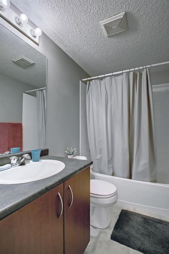 8314 - 304 Mackenzie Way Sw, Condo with 2 bedrooms, 2 bathrooms and 2 parking in Calgary AB | Image 6