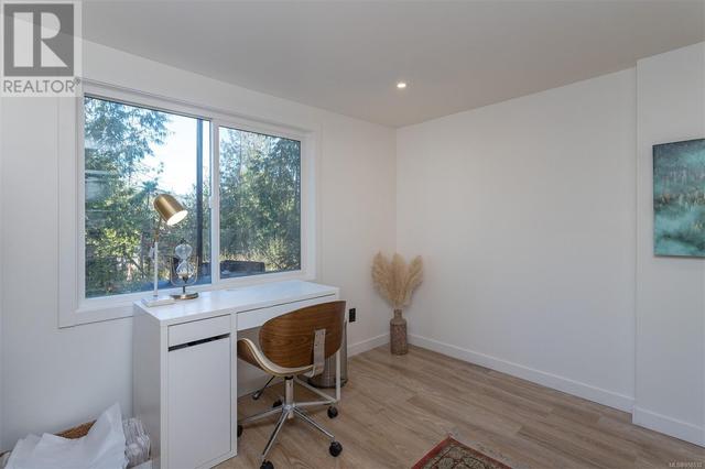 Large second bedroom currently being used as an office | Image 21