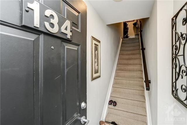134 Bluestone Private, House attached with 2 bedrooms, 3 bathrooms and 1 parking in Ottawa ON | Image 2