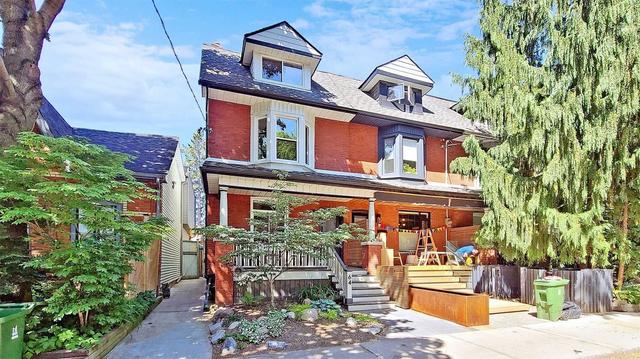 64 De Grassi St, House semidetached with 3 bedrooms, 2 bathrooms and 0 parking in Toronto ON | Image 1