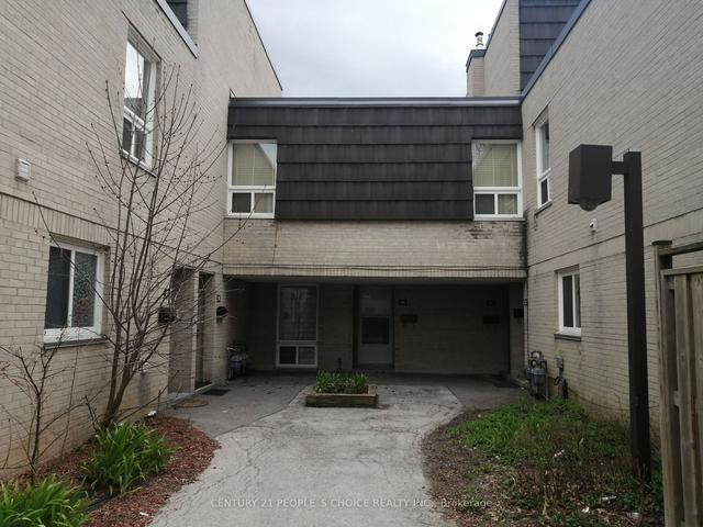 14 - 23 Four Winds Dr, Townhouse with 4 bedrooms, 3 bathrooms and 1 parking in Toronto ON | Image 1