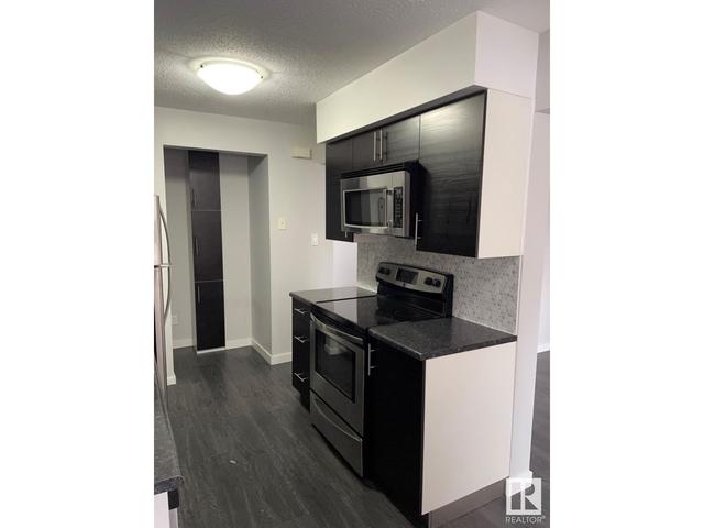 1 - 14310 80 St Nw, House attached with 2 bedrooms, 1 bathrooms and null parking in Edmonton AB | Image 5