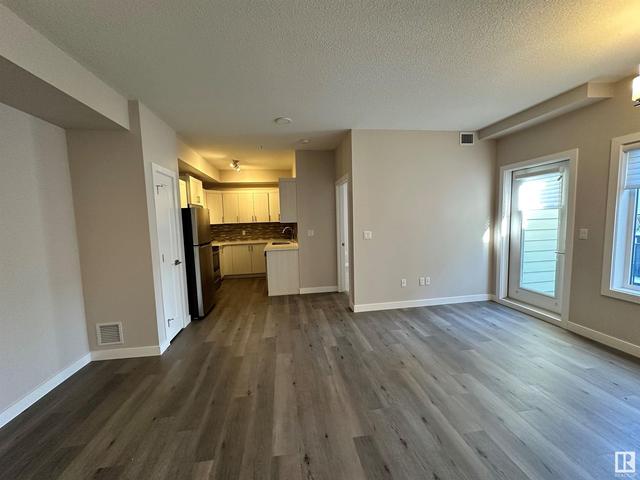 405 - 560 Griesbach Pr Nw, Condo with 2 bedrooms, 2 bathrooms and null parking in Edmonton AB | Image 5