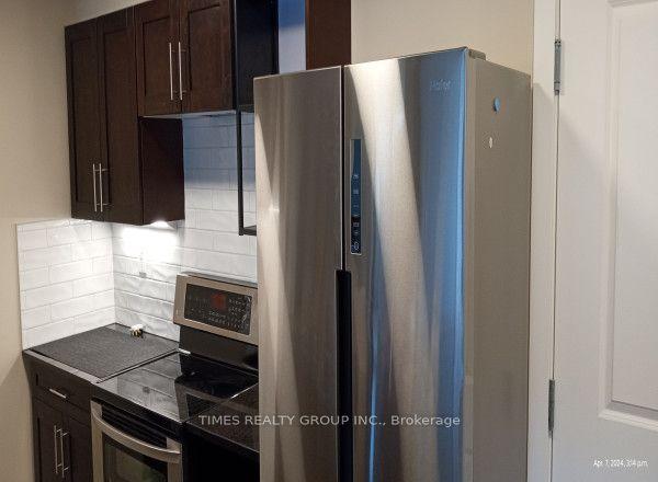 1405 - 403 Mackenzie Way Sw, Condo with 2 bedrooms, 2 bathrooms and 2 parking in Airdrie AB | Image 2