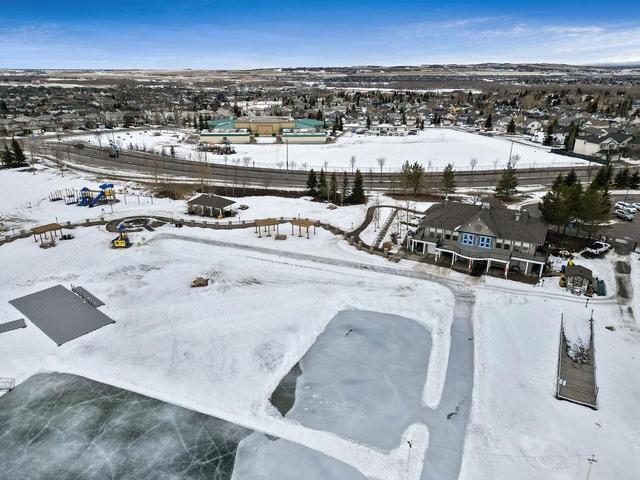 12 Crystal Shores Cove, Home with 2 bedrooms, 2 bathrooms and 2 parking in Calgary AB | Image 33