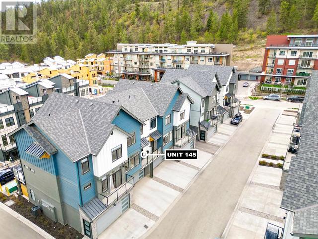 145 - 1435 Cara Glen Court, House attached with 3 bedrooms, 2 bathrooms and 4 parking in Kelowna BC | Image 2