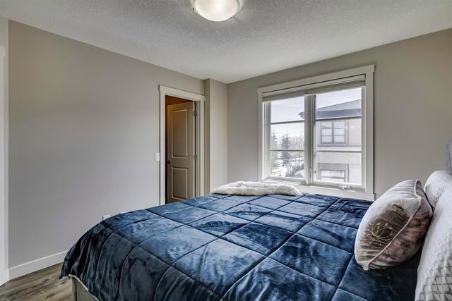 35 Aspen Hills Green Sw, Home with 2 bedrooms, 2 bathrooms and 2 parking in Calgary AB | Image 29